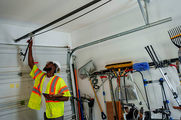 Professional Garage Door Panel Replacement technician working in Monroe Manor, NJ